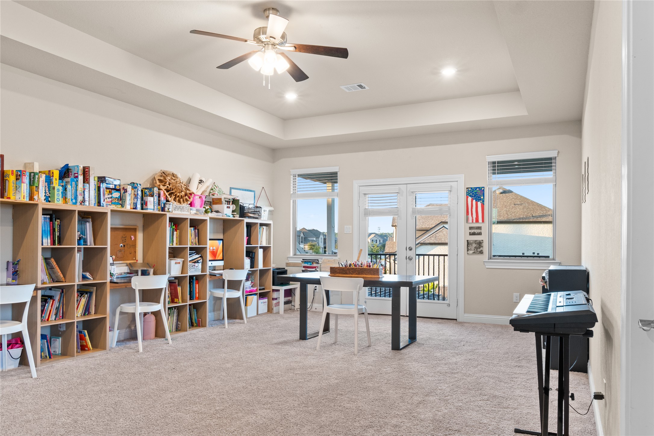 7518 Windsong Bend Road Spring, TX 77379 - Photo 35 of 49 a room with furniture and a book shelf