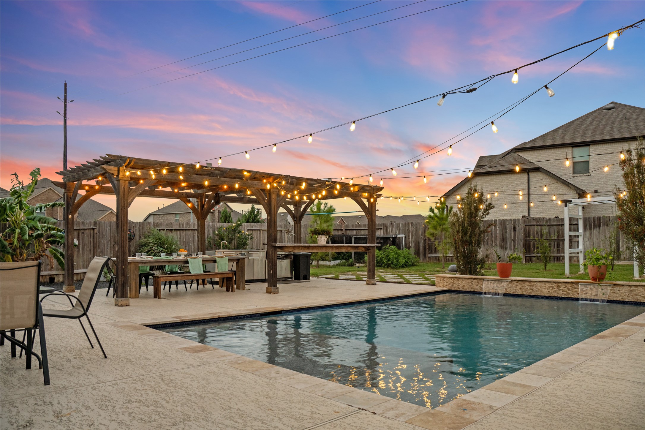 7518 Windsong Bend Road Spring, TX 77379 - Photo 40 of 49 a view of a swimming pool with outdoor seating