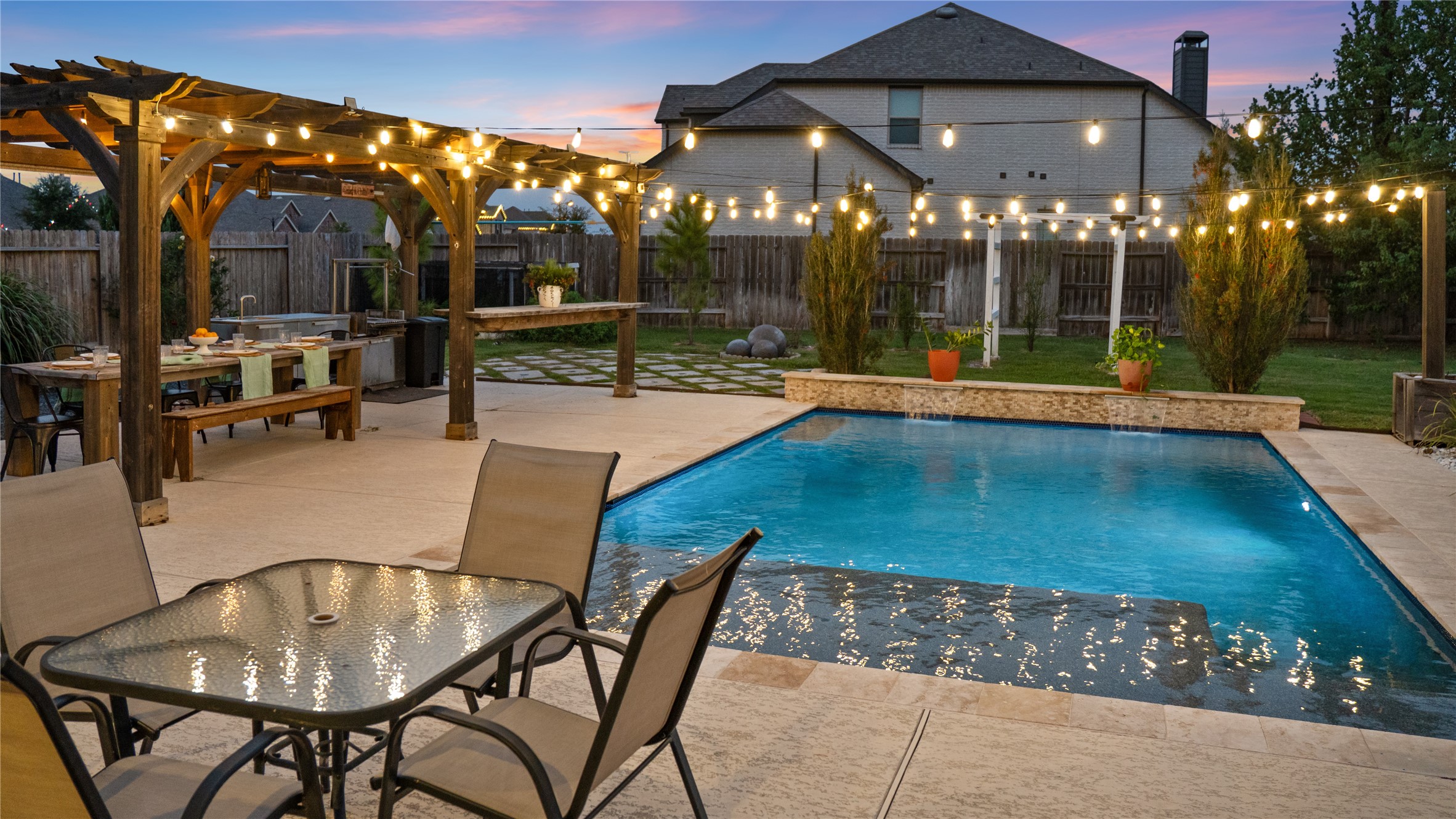 7518 Windsong Bend Road Spring, TX 77379 - Photo 47 of 49 a view of a patio with swimming pool table and chairs
