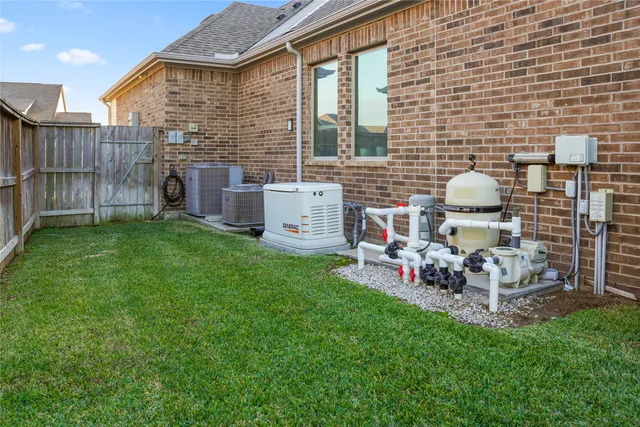 a view of a porch with chairs and backyard