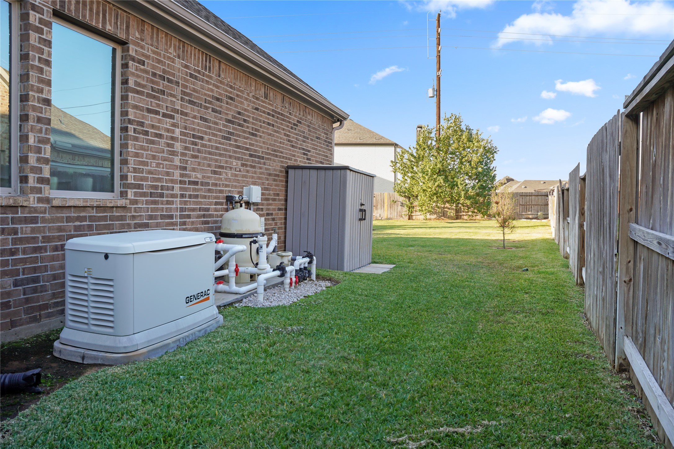7518 Windsong Bend Road Spring, TX 77379 - Photo 49 of 49 a view of a porch with chairs and backyard