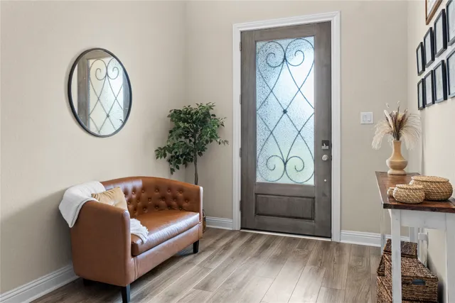 a view of hallway that has closet