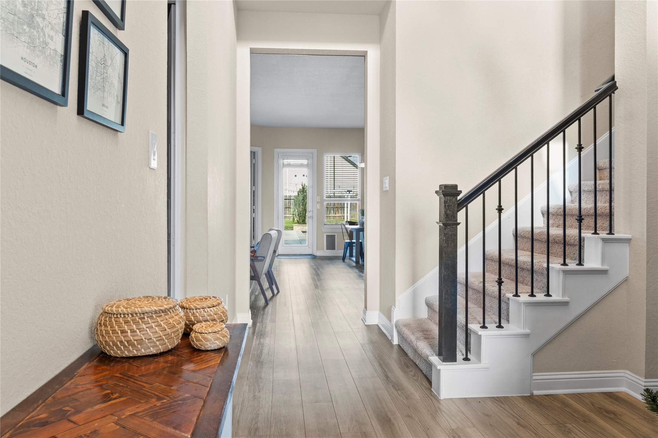 7518 Windsong Bend Road Spring, TX 77379 - Photo 8 of 49 a living room with furniture and a wooden floor