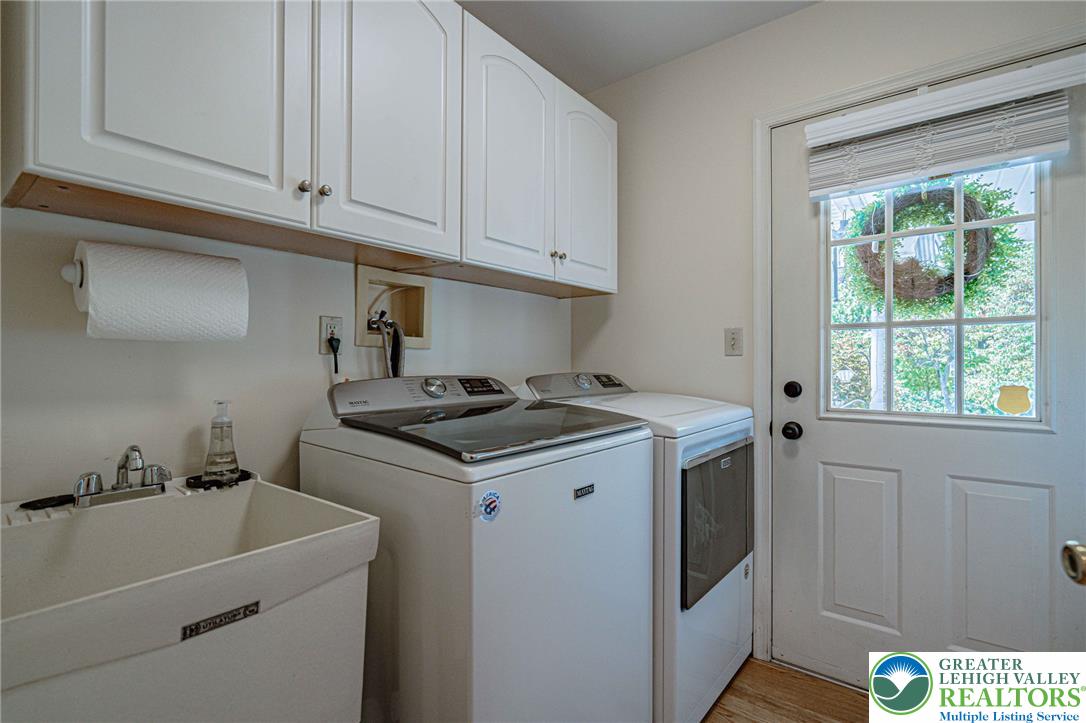 4542 Springfield Drive Coplay, PA 18037 - Photo 36 of 89 Convenient, private laundry room featuring upper storage cabinetry.