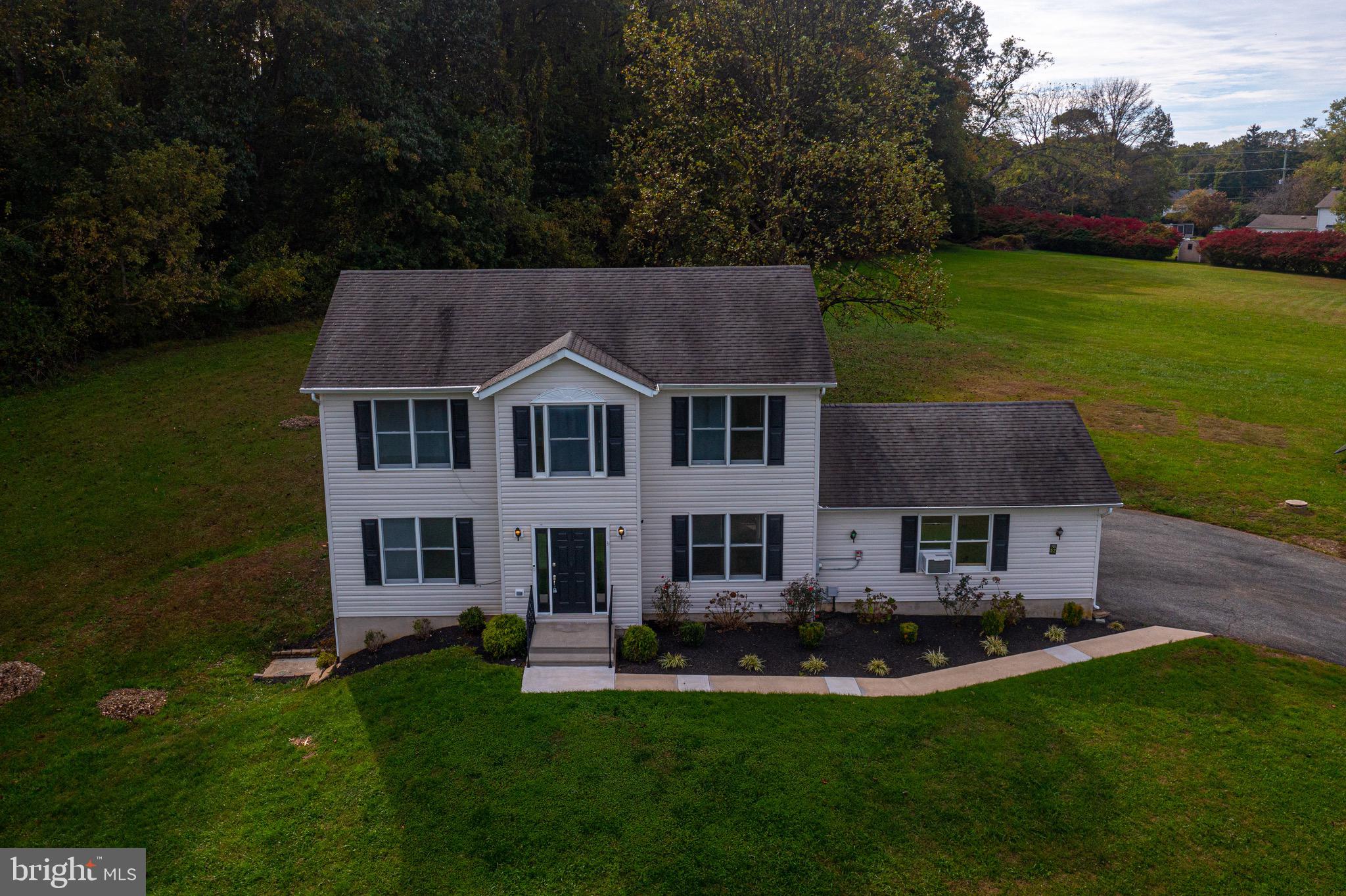 52 Craig Court Conowingo, MD 21918 - Photo 3 of 101 a aerial view of a house with swimming pool yard and green space