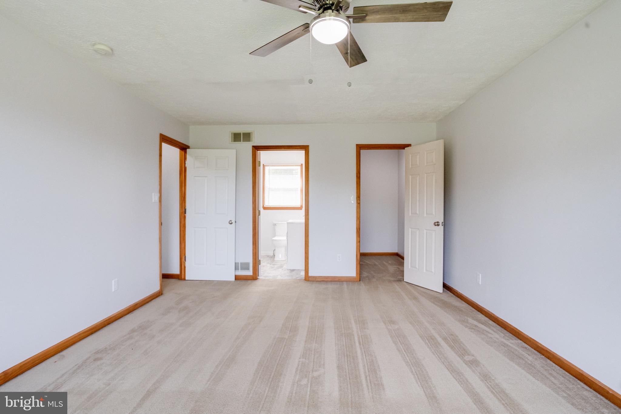 52 Craig Court Conowingo, MD 21918 - Photo 49 of 101 wooden floor in an empty room with a window