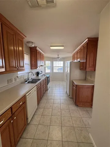 a large kitchen with a cabinets and counter space