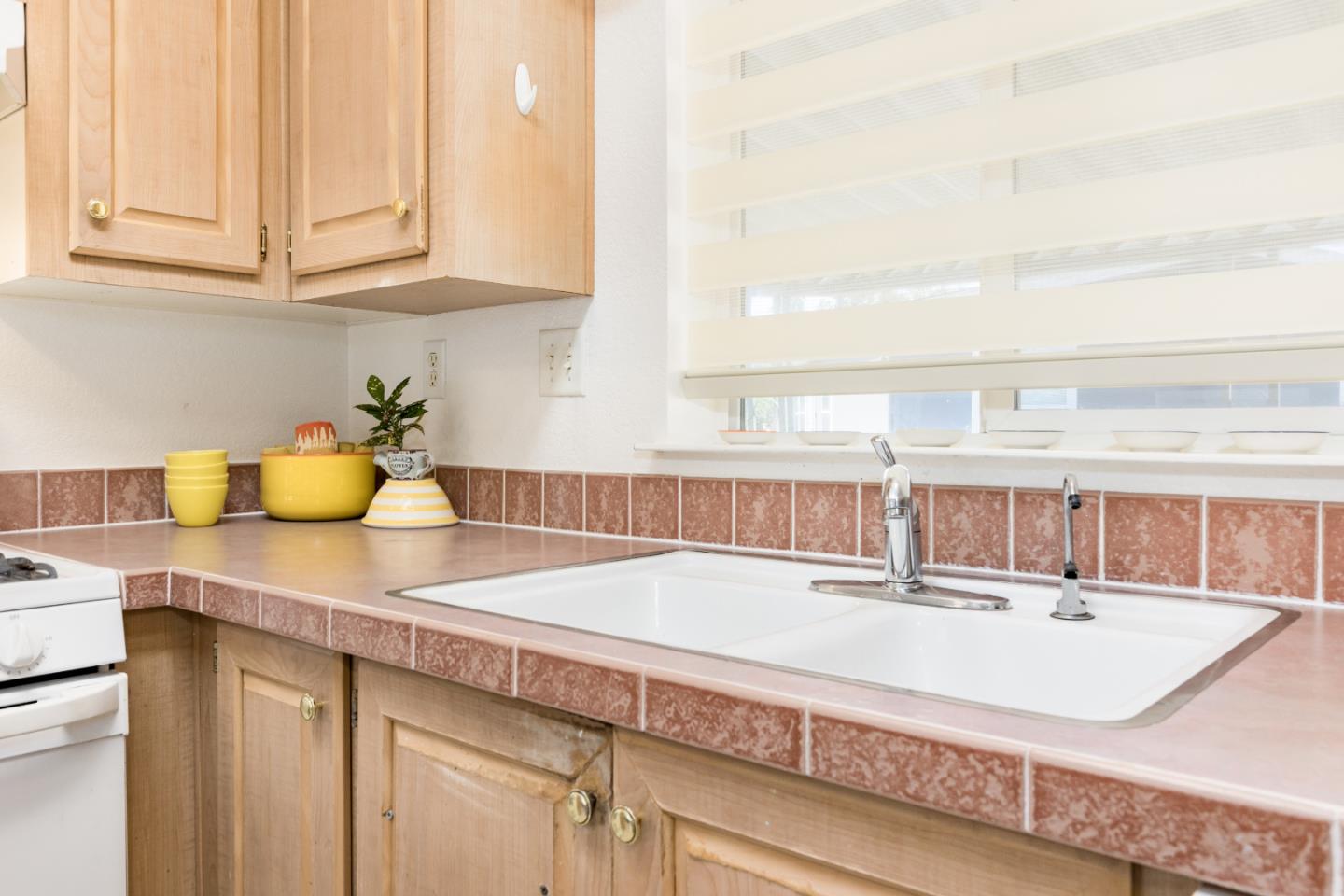 2546 Capitola Road, Unit 6 Santa Cruz, CA 95062 - Photo 13 of 40 a kitchen with a sink and a window