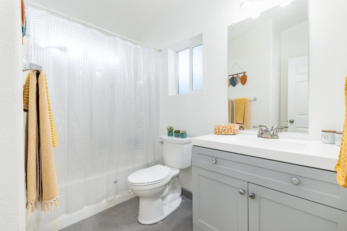 2546 Capitola Road, Unit 6 Santa Cruz, CA 95062 - Photo 18 of 40 a bathroom with a sink a toilet and shower