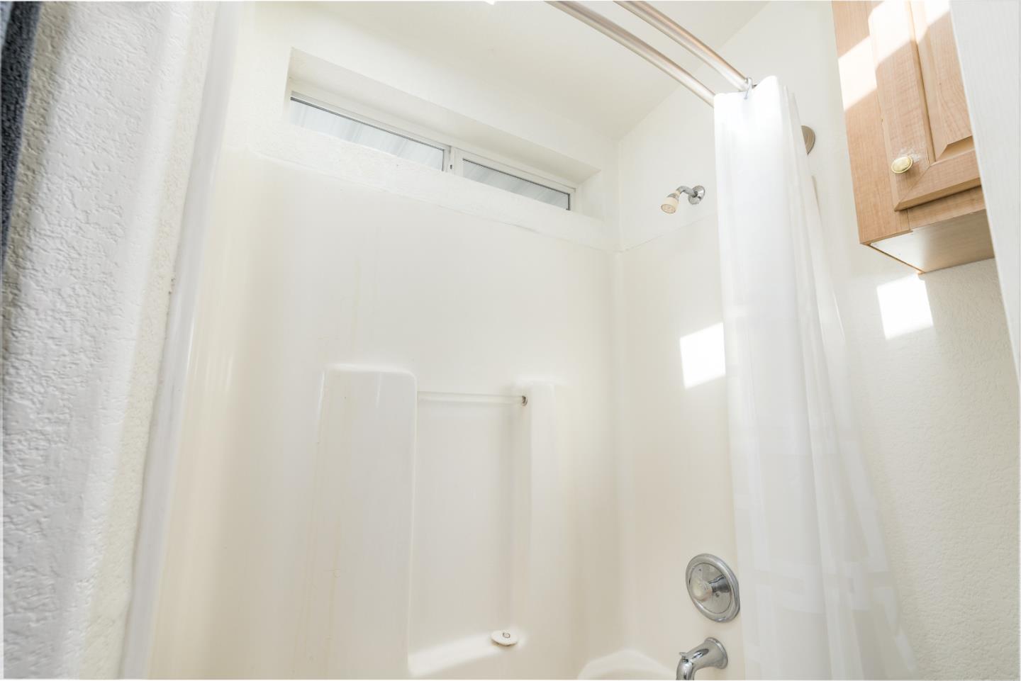 2546 Capitola Road, Unit 6 Santa Cruz, CA 95062 - Photo 25 of 40 a bathroom with a shower