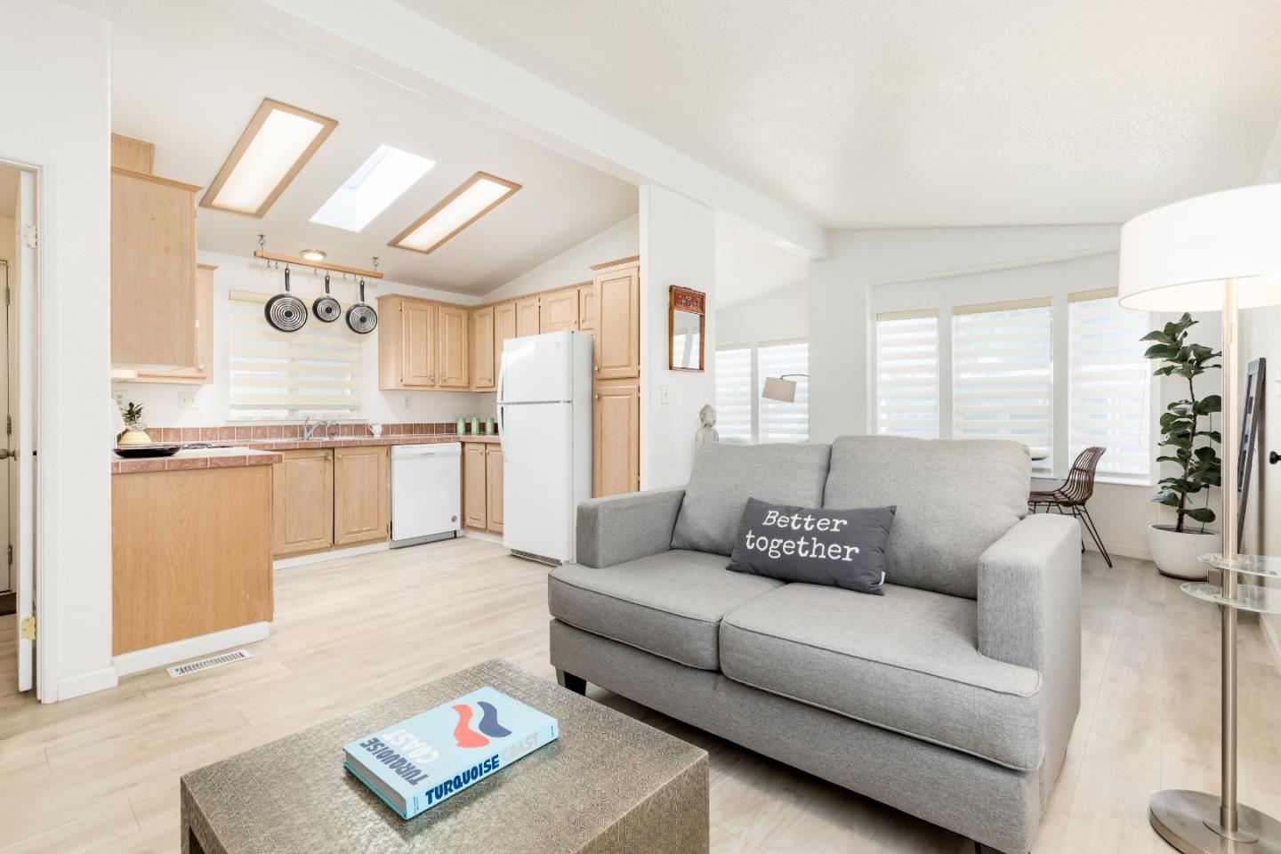 2546 Capitola Road, Unit 6 Santa Cruz, CA 95062 - Photo 3 of 40 a living room with furniture and a kitchen view