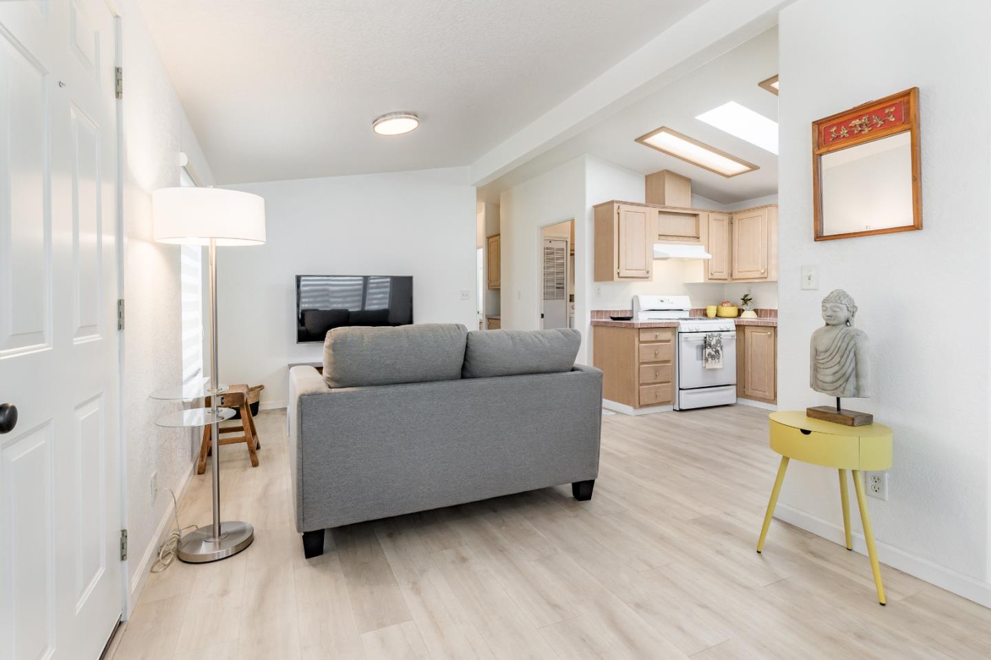 2546 Capitola Road, Unit 6 Santa Cruz, CA 95062 - Photo 6 of 40 a living room with furniture and a table