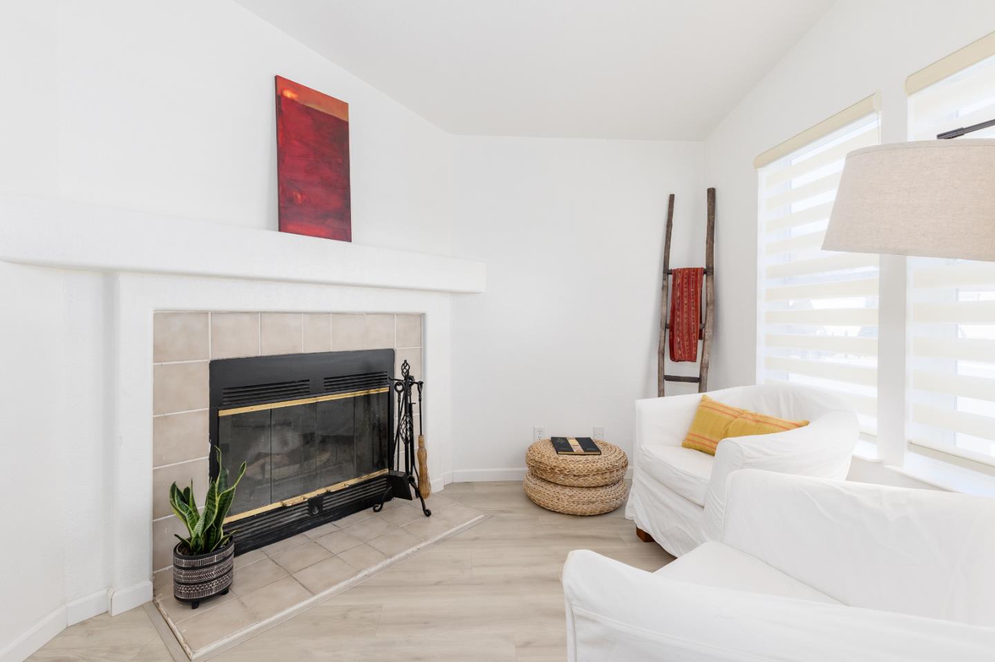 2546 Capitola Road, Unit 6 Santa Cruz, CA 95062 - Photo 7 of 40 a living room with furniture and a fireplace