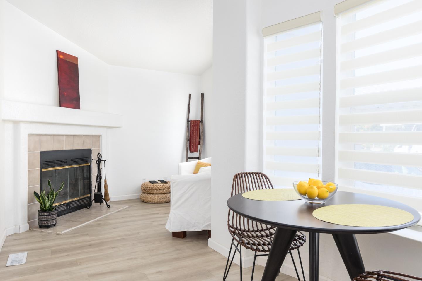 2546 Capitola Road, Unit 6 Santa Cruz, CA 95062 - Photo 8 of 40 a living room with furniture a table and a fireplace