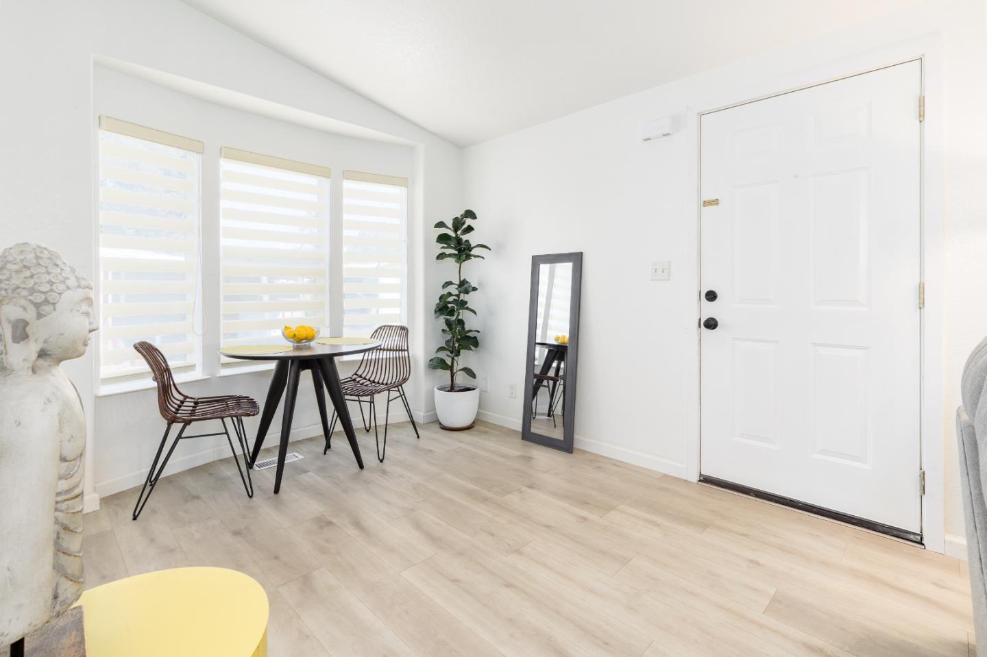 2546 Capitola Road, Unit 6 Santa Cruz, CA 95062 - Photo 9 of 40 a view of a livingroom with furniture and a window