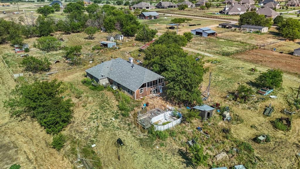 7331 Faught Road Argyle, TX 76226 - Photo 12 of 22 an aerial view of residential house with pool and yard