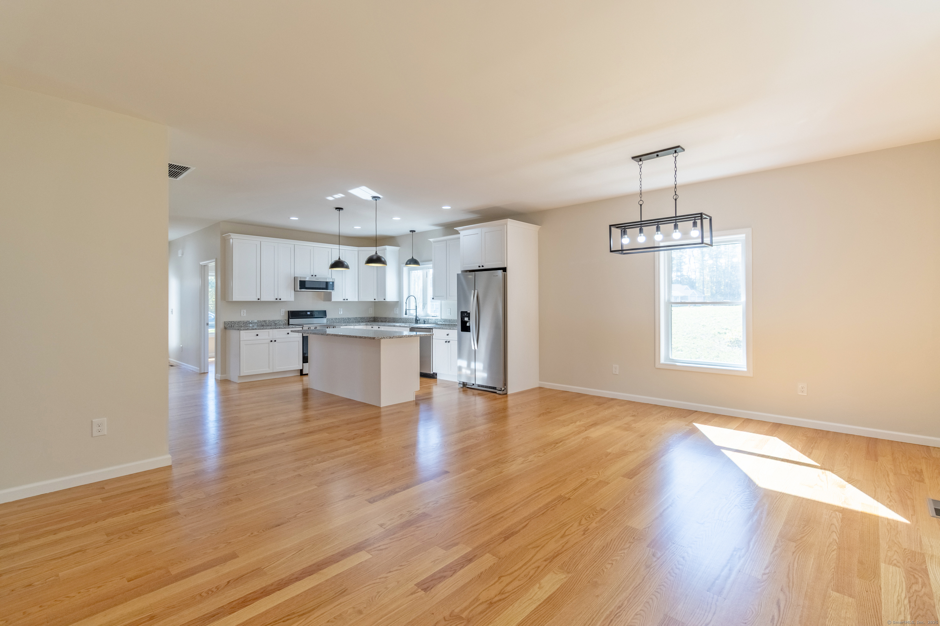 18 Spring Hill Road Storrs Mansfield, CT 06268 - Photo 13 of 31 a view of kitchen with wooden floor and window