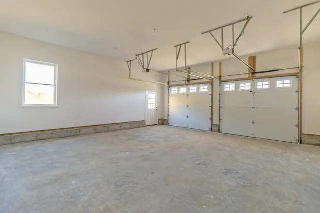 a view of a room with lots of gym equipment