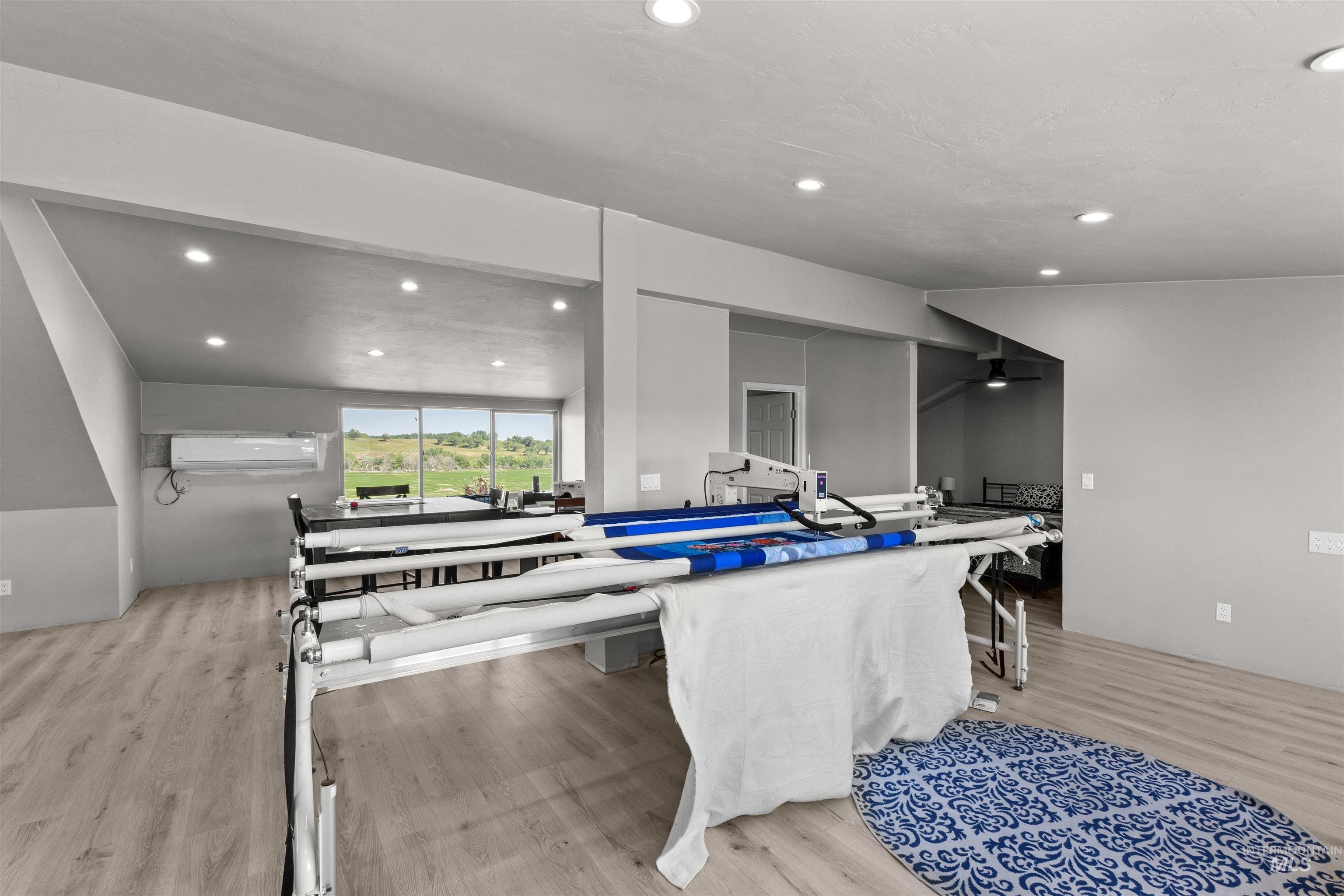 1030 Desert Glen Road Adrian, OR 97901 - Photo 41 of 47 Expansive interior space featuring wood-finish flooring and recessed lighting
