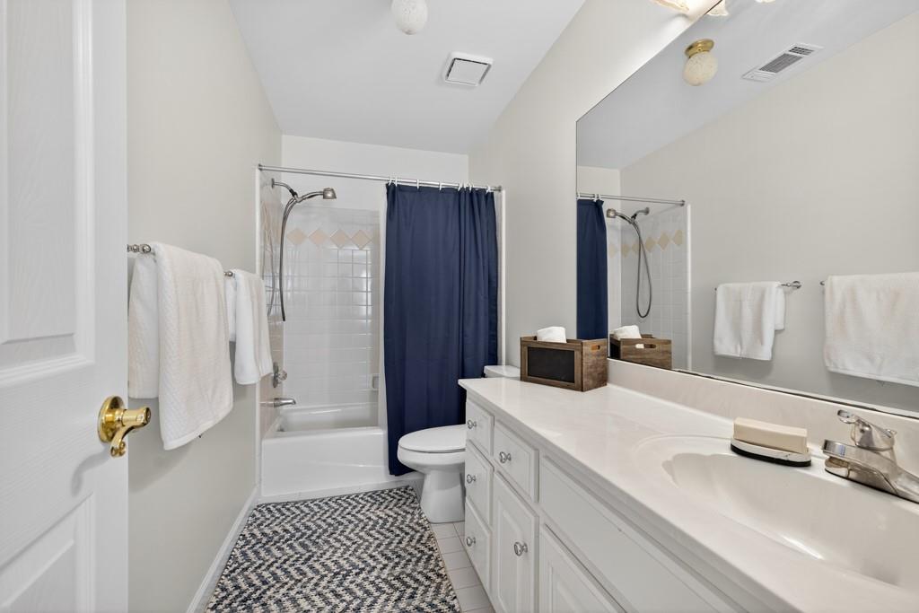 1430 Roanoke Trace Grayson, GA 30017 - Photo 32 of 62 a bathroom with a sink toilet and shower