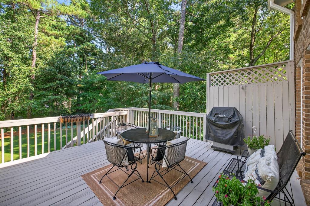 1430 Roanoke Trace Grayson, GA 30017 - Photo 47 of 62 a view of a deck with furniture