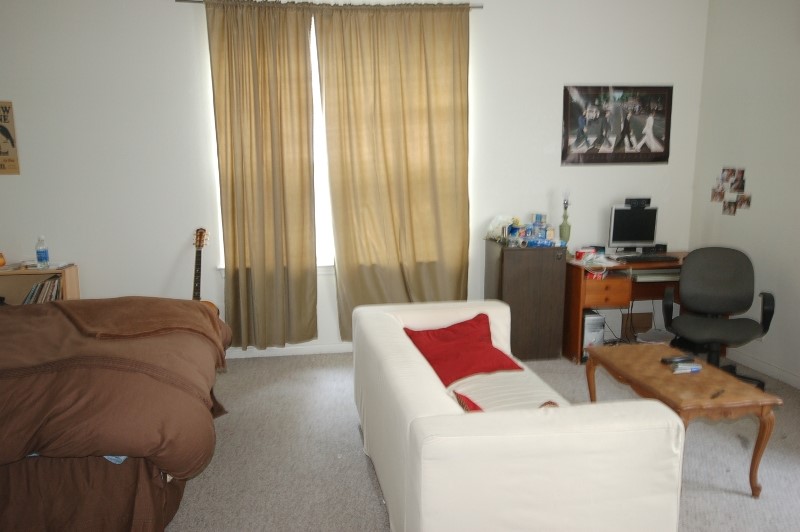 5406 Martin Avenue, Unit A Austin, TX 78751 - Photo 3 of 3 a bedroom with a bed and furniture