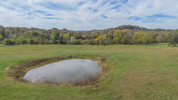 a view of a lake with a mountain in the background