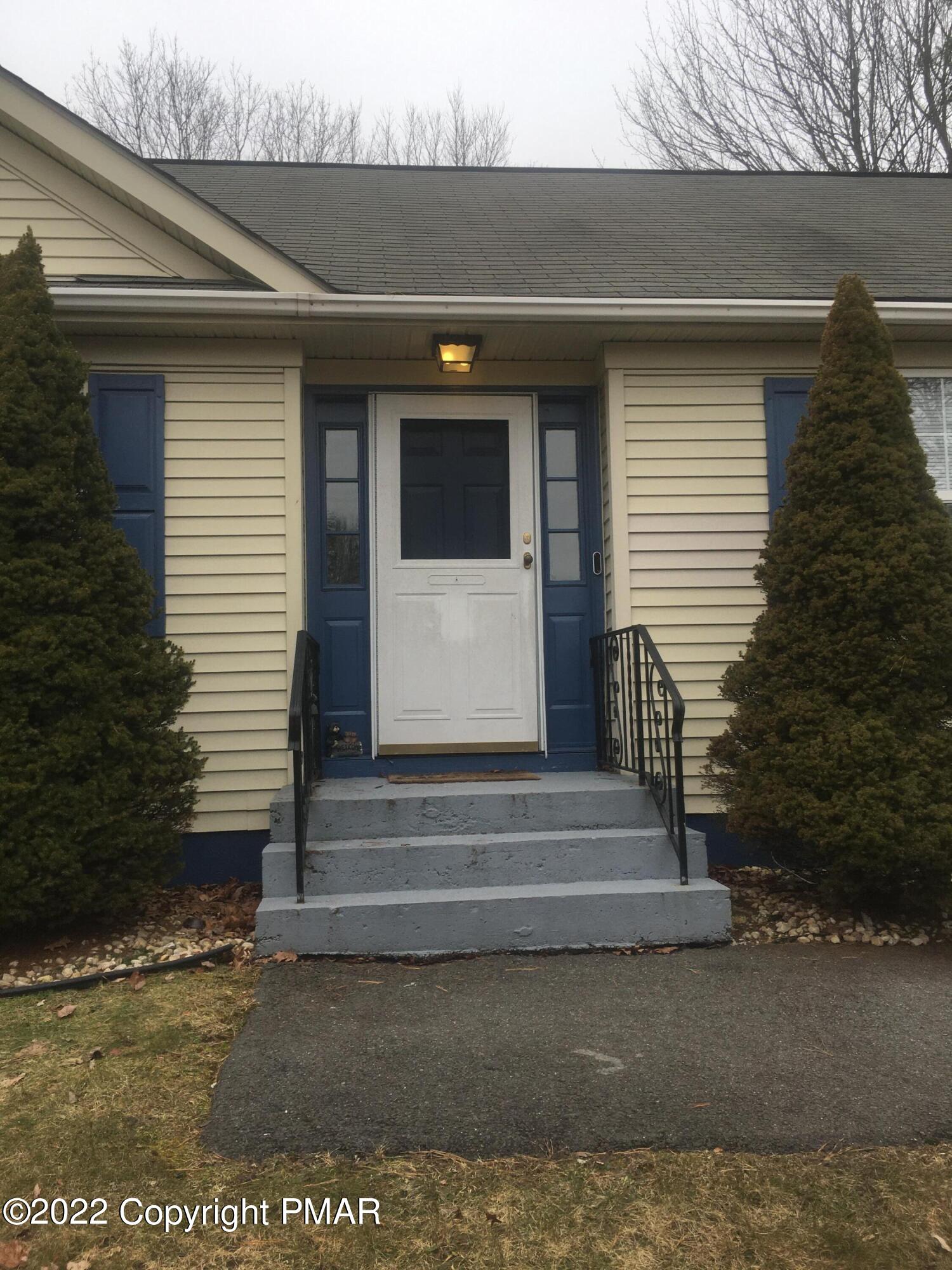 177 Granite Road Long Pond, PA 18334 - Photo 2 of 16 a front view of a house with a garage