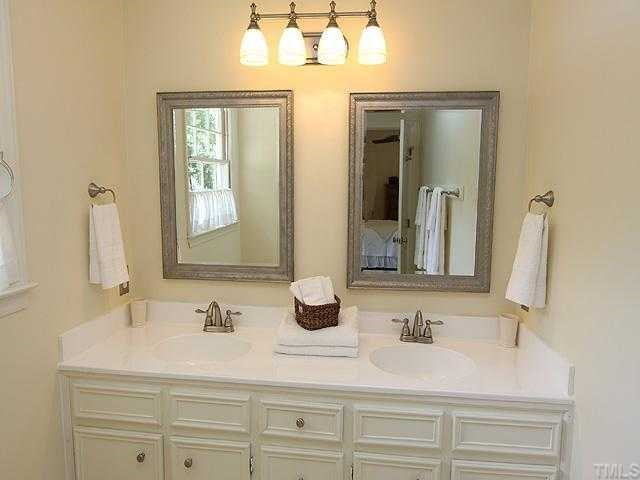 10033 Sycamore Road Raleigh, NC 27613 - Photo 7 of 12 Remodeled and Updated Master Bath, New Light Fixtures, New Sink, New Faucets, New Paint, New Mirrors Master Bath/Spa