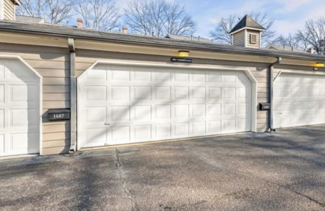 1687 Kimbrough Road, Unit 1687 Germantown, TN 38138 - Photo 15 of 20 a view of an empty room with a balcony