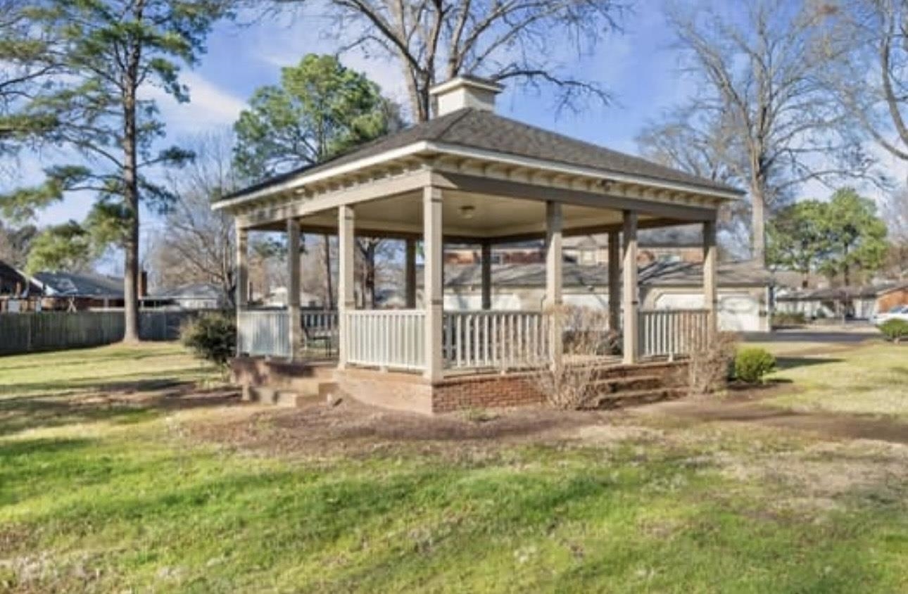 1687 Kimbrough Road, Unit 1687 Germantown, TN 38138 - Photo 17 of 20 a view of a house with backyard and a patio