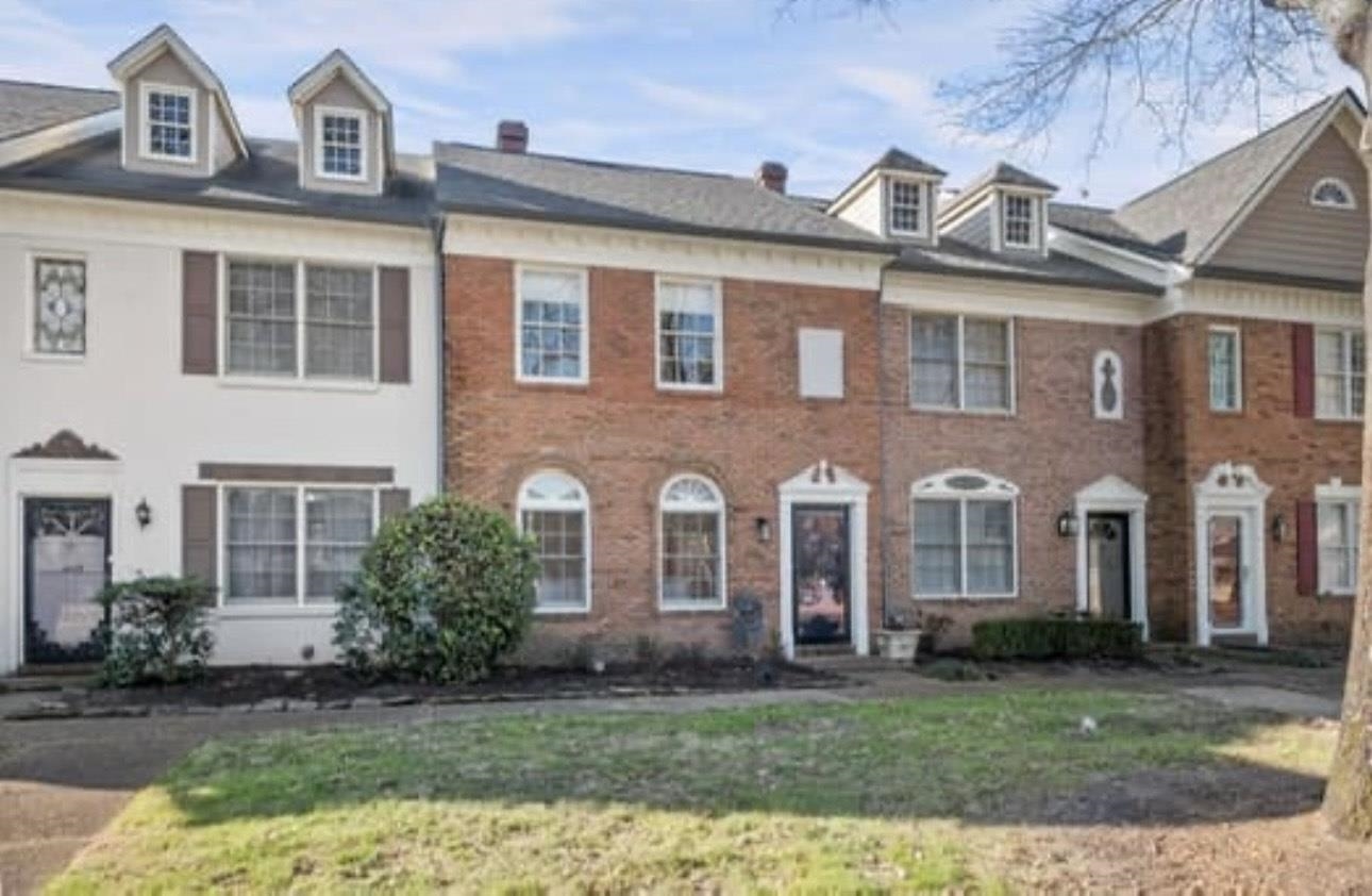 1687 Kimbrough Road, Unit 1687 Germantown, TN 38138 - Photo 19 of 20 a front view of a house with a yard