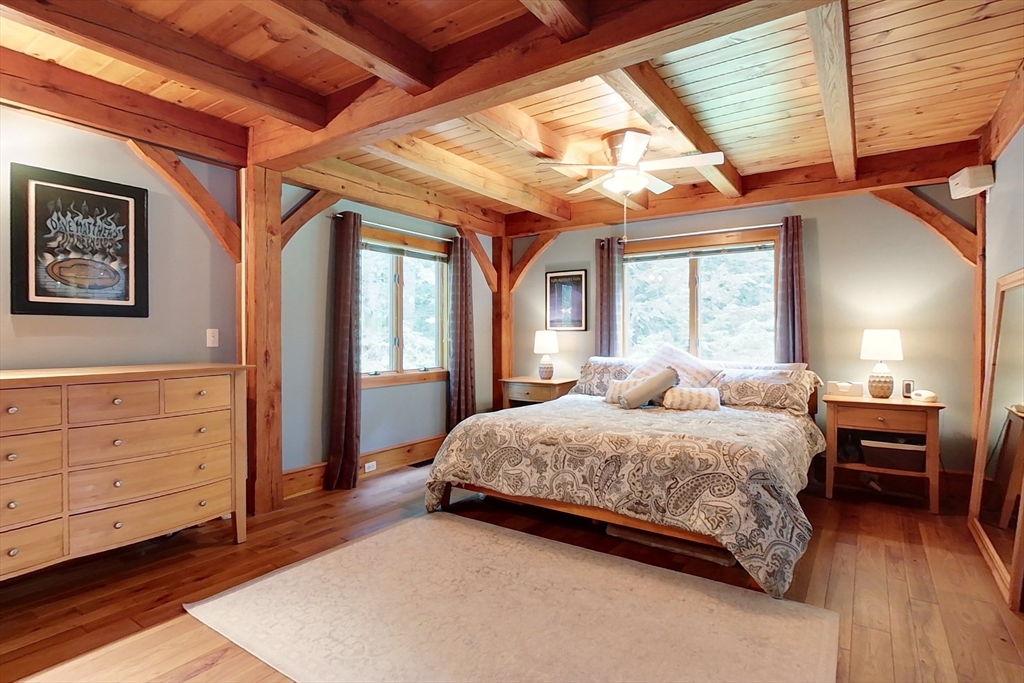 23 A Heald Street Pepperell, MA 01463 - Photo 16 of 42 a bedroom with a bed and a dresser