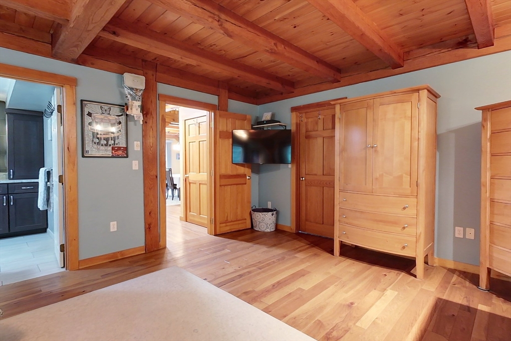 23 A Heald Street Pepperell, MA 01463 - Photo 18 of 42 a view of empty room with wooden floor