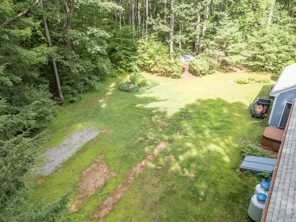 23 A Heald Street Pepperell, MA 01463 - Photo 32 of 42 a view of an outdoor space and a yard
