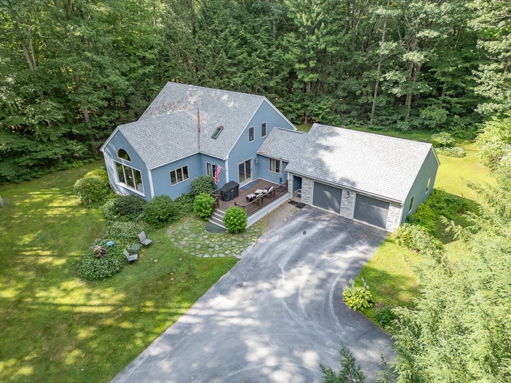 23 A Heald Street Pepperell, MA 01463 - Photo 35 of 42 an aerial view of a house with a big yard plants and large trees