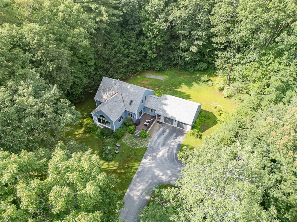 23 A Heald Street Pepperell, MA 01463 - Photo 36 of 42 an aerial view of a house with a yard basket ball court and outdoor seating