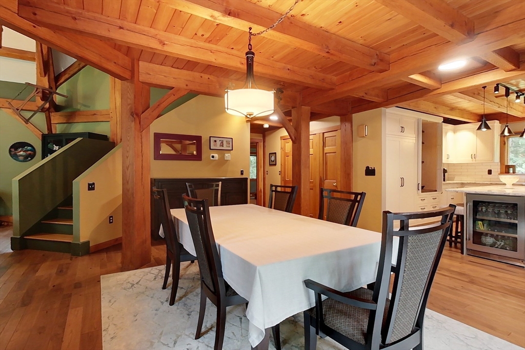 23 A Heald Street Pepperell, MA 01463 - Photo 8 of 42 a view of a dining room with furniture and wooden floor