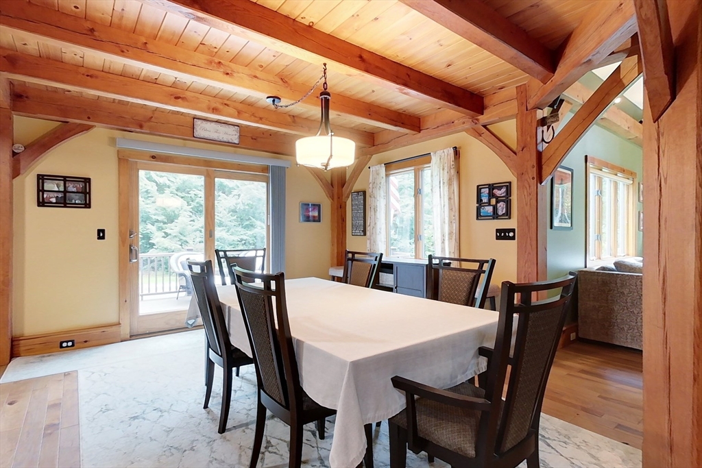 23 A Heald Street Pepperell, MA 01463 - Photo 10 of 42 a view of a dining room with furniture window and wooden floor