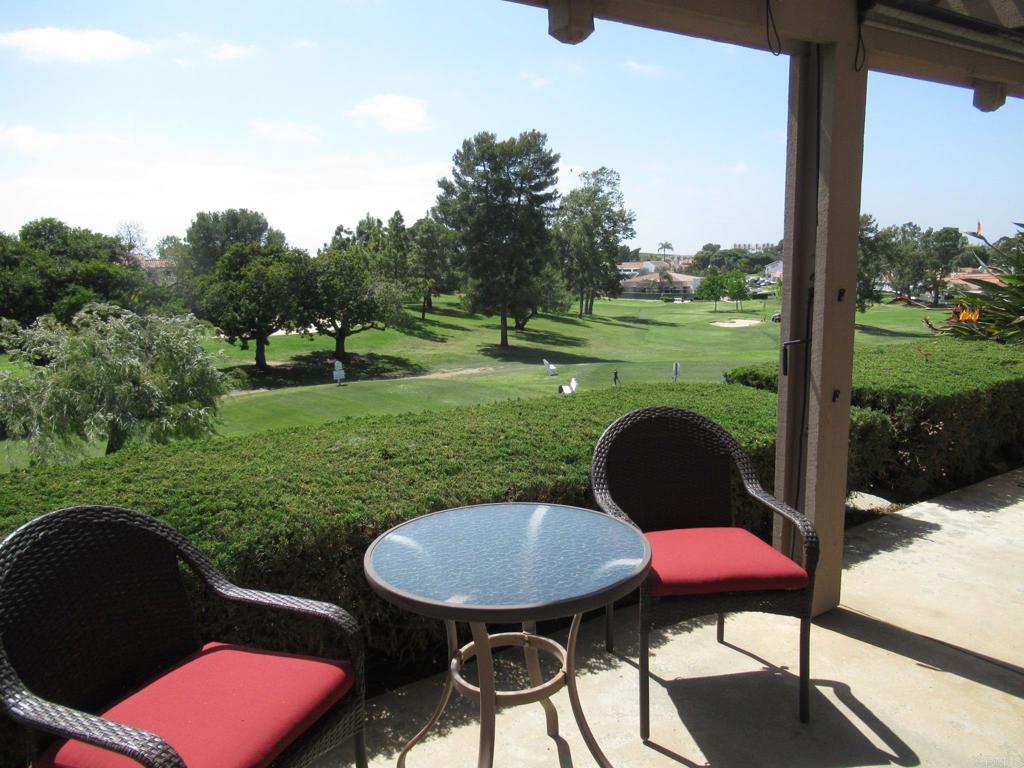4913 Alicante Way Oceanside, CA 92056 - Photo 13 of 34 a couple of chairs that are sitting in the grass