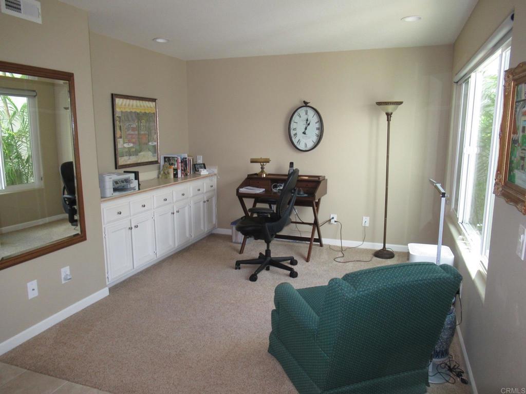 4913 Alicante Way Oceanside, CA 92056 - Photo 17 of 34 a living room with furniture and a window