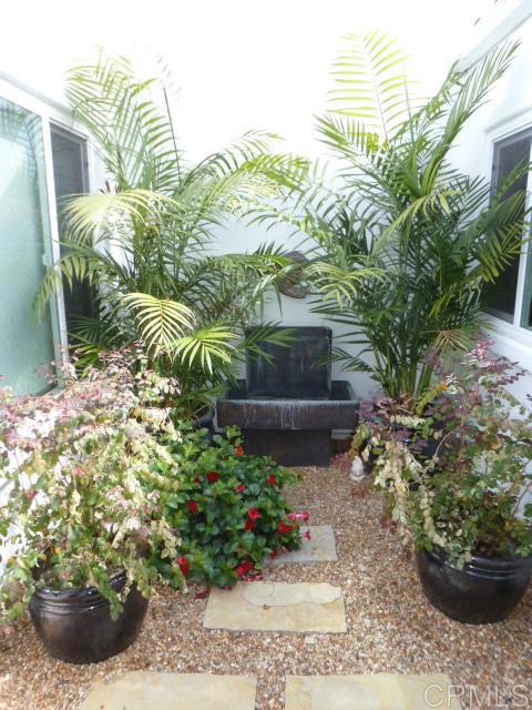 4913 Alicante Way Oceanside, CA 92056 - Photo 18 of 34 a view of a back yard of the house