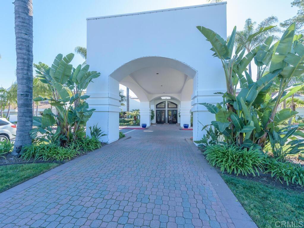 4913 Alicante Way Oceanside, CA 92056 - Photo 27 of 34 a view of a house with a yard and plant