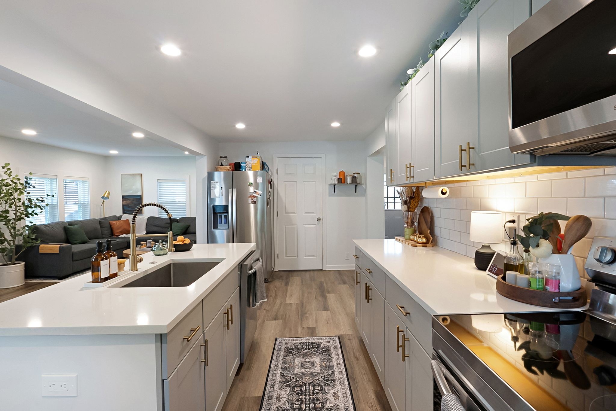 302 Dupont Avenue Madison, TN 37115 - Photo 12 of 36 a kitchen with a sink appliances and cabinets