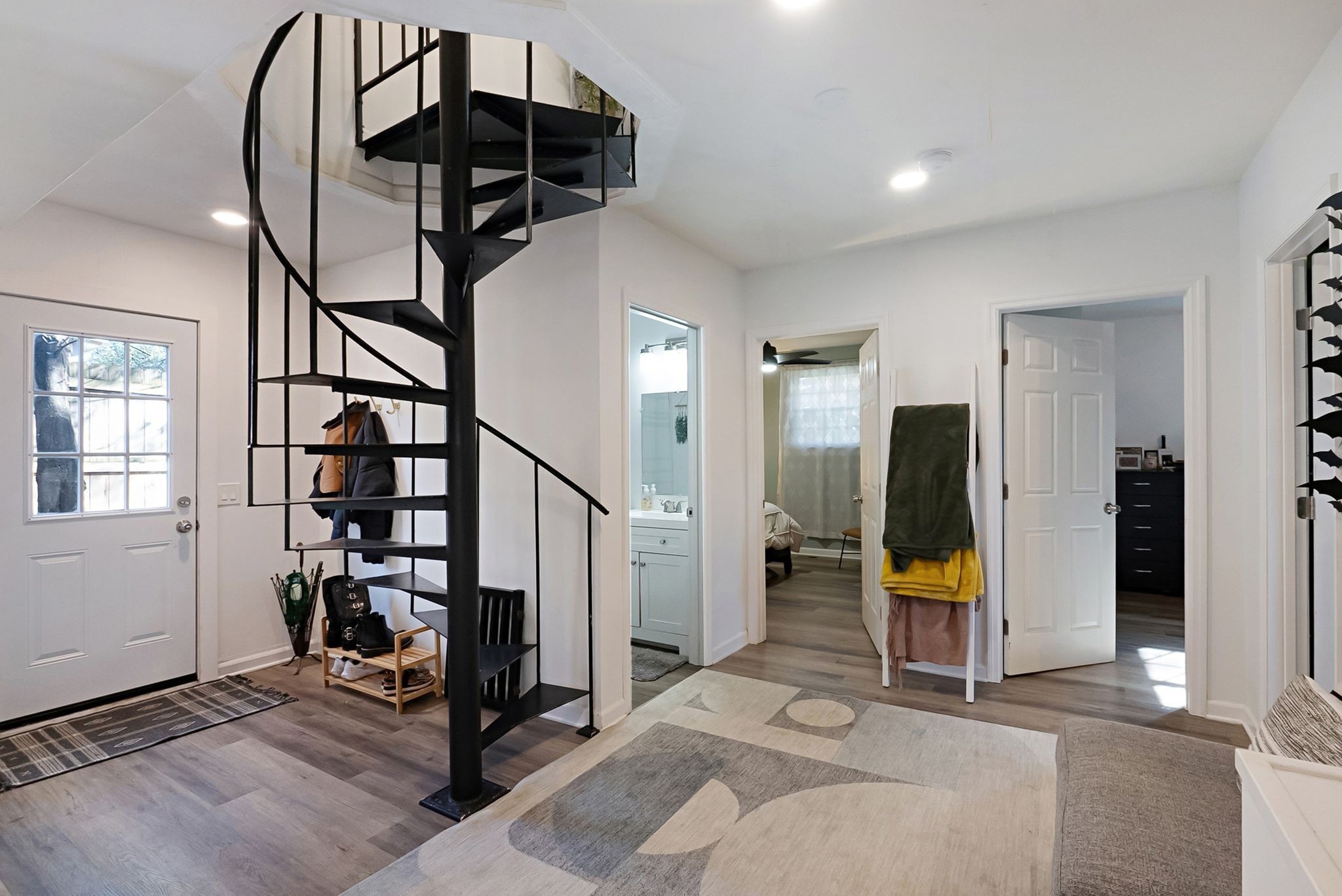 302 Dupont Avenue Madison, TN 37115 - Photo 14 of 36 a view of a hallway with wooden floor and staircase