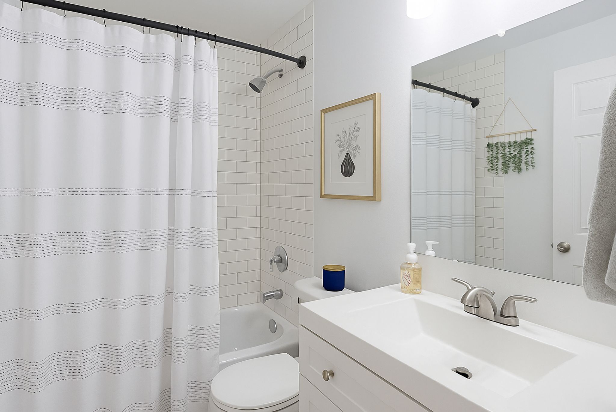 302 Dupont Avenue Madison, TN 37115 - Photo 15 of 36 a bathroom with a sink toilet and shower