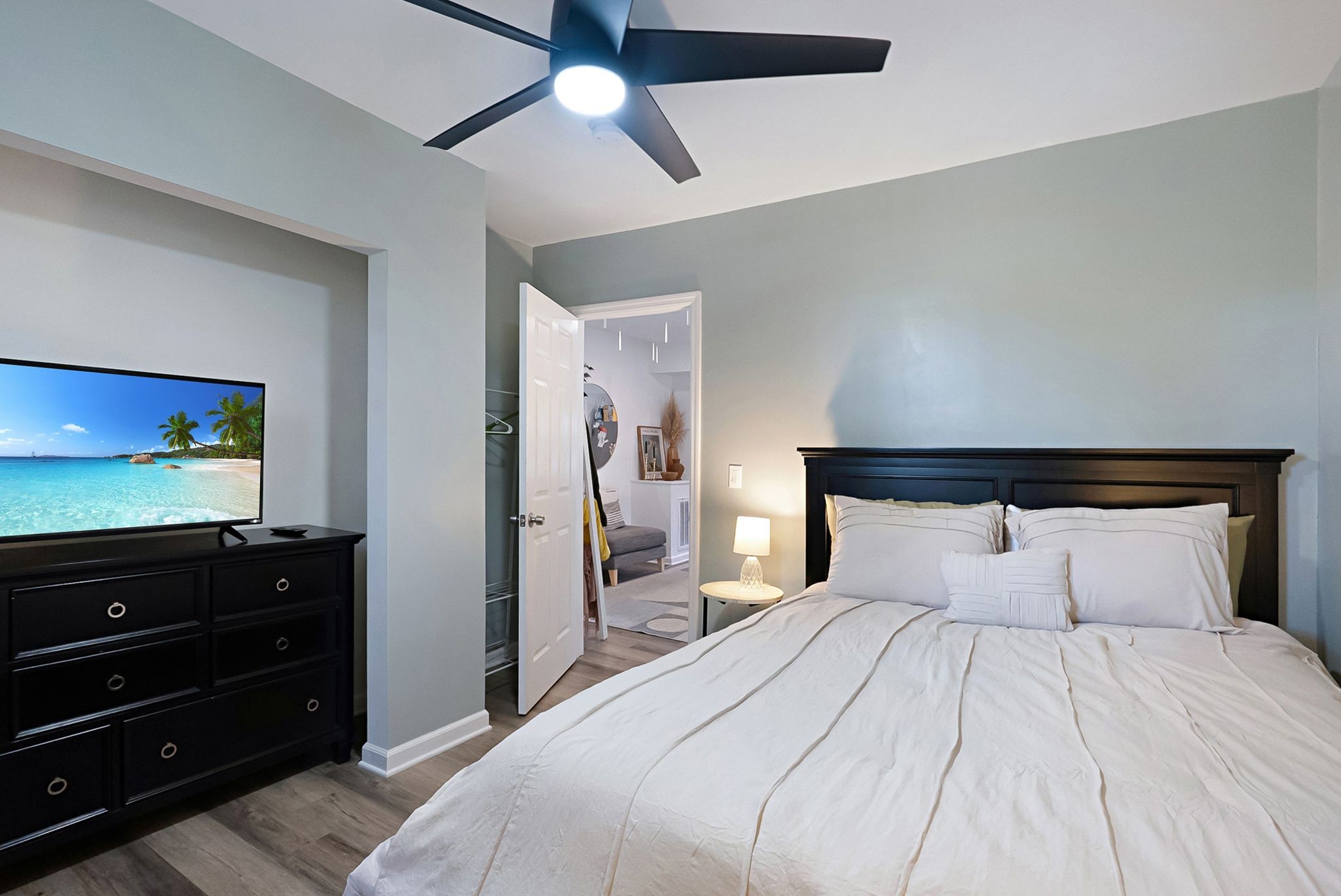 302 Dupont Avenue Madison, TN 37115 - Photo 17 of 36 a bedroom with a bed and a flat screen tv