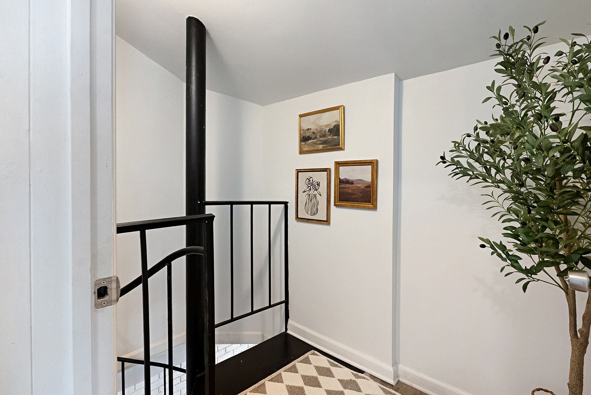 302 Dupont Avenue Madison, TN 37115 - Photo 22 of 36 a view of a hallway with wooden floor and staircase