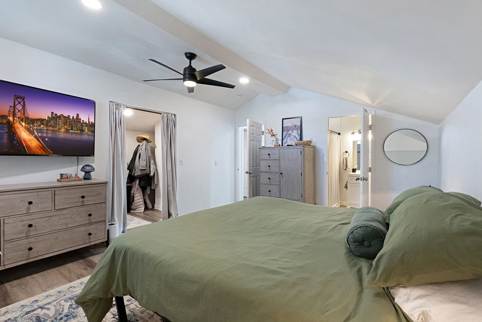 302 Dupont Avenue Madison, TN 37115 - Photo 27 of 36 a bedroom with a bed and a flat screen tv