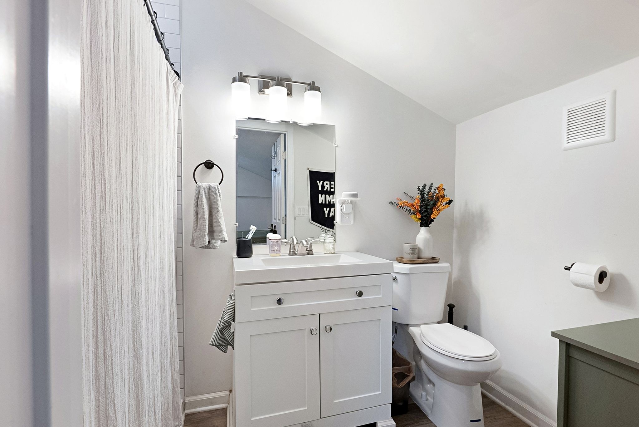 302 Dupont Avenue Madison, TN 37115 - Photo 28 of 36 a bathroom with a sink toilet and mirror